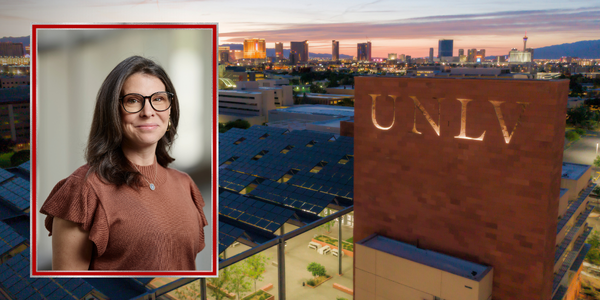 Portrait of the 2026 College of Urban Affairs Alumna of the Year at UNLV with the campus and Las Vegas skyline visible in the background.